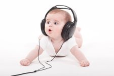 charming-baby-white-with-headphones-listening-music_88135-1002.jpg